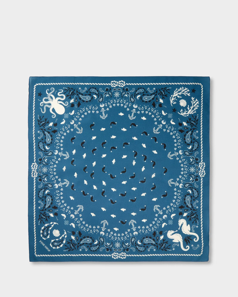 Blue bandana with white patterns on a white background