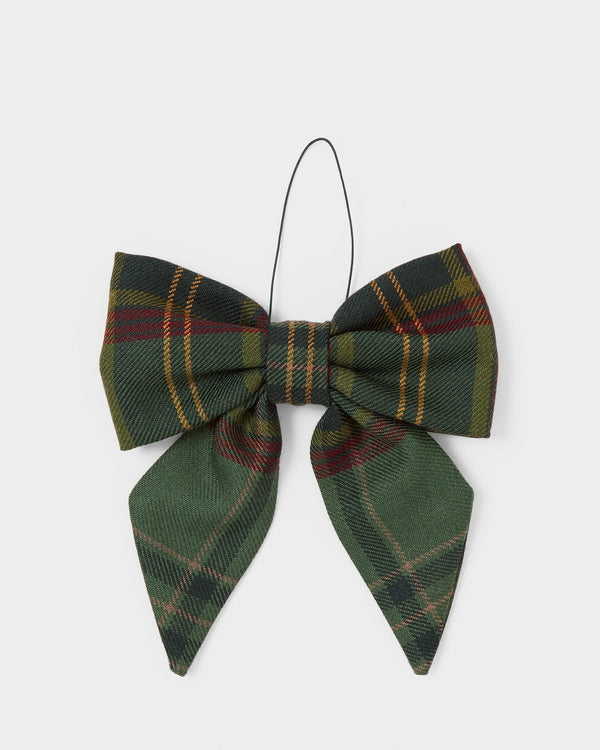 Green tartan bow decoration on a white background